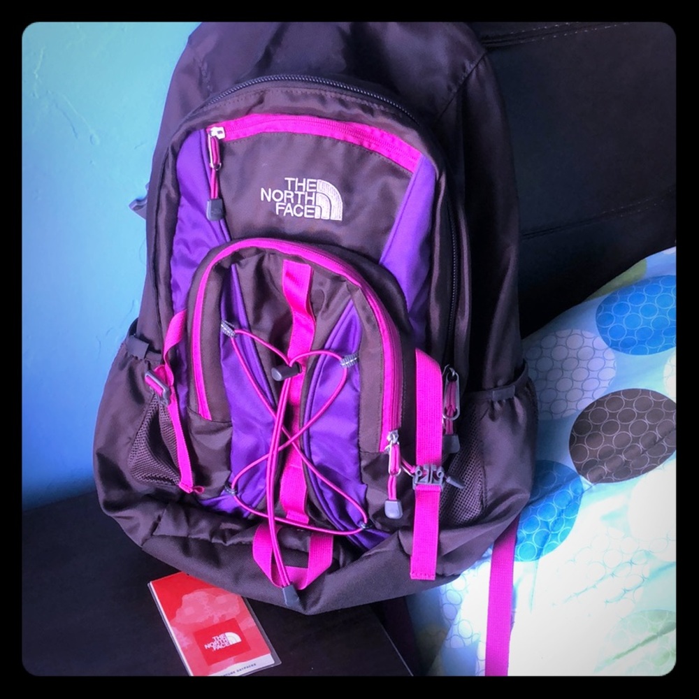 The North Face pink/purple/brown Heckler backpack